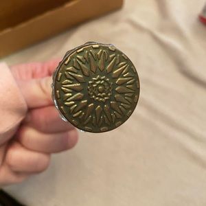 Beautiful glass and metal drawer pulls. Never used. Three sets of 4!